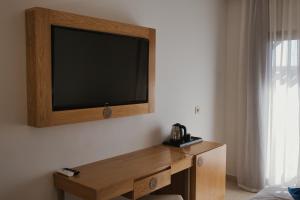 TV a/nebo společenská místnost v ubytování Diwane Hotel & Spa Marrakech