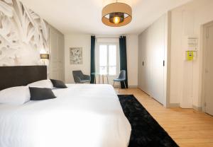 Posteľ alebo postele v izbe v ubytovaní Le Night Dream - Sauna - Gare - Palais des Congrès - Rêve au Mans