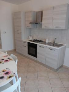 Nhà bếp/bếp nhỏ tại Casa Azzurra +14 ảnh