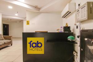 Kuchyň nebo kuchyňský kout v ubytování FabHotel Moro Rohini Sector 11