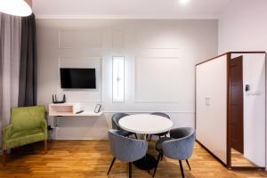 TV a/nebo společenská místnost v ubytování ON/SET APARTHOTEL