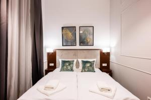 Postel nebo postele na pokoji v ubytování ON/SET APARTHOTEL
