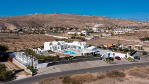 an aerial view of a villa with a pool at Santa Irina Luxury Sunny Lofts in Perivolos