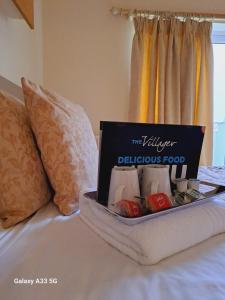 Cama ou camas em um quarto em Villager Hotel, Ingoldmells