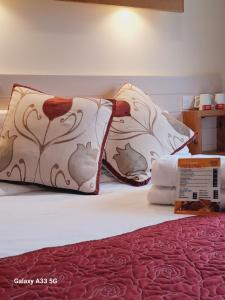 Cama ou camas em um quarto em Villager Hotel, Ingoldmells