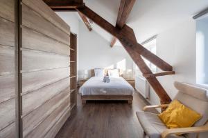 Säng eller sängar i ett rum på Overijse Grande Residence