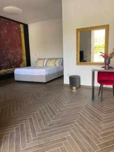 Postel nebo postele na pokoji v ubytování Residenza Agli Scavi