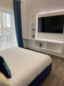 Postel nebo postele na pokoji v ubytování Residenza da Zia Donata