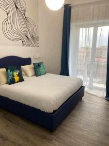 Postel nebo postele na pokoji v ubytování Residenza da Zia Donata + 12 fotografií