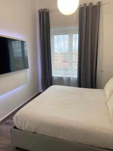 Postel nebo postele na pokoji v ubytování Residenza da Mimi