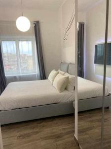 Postel nebo postele na pokoji v ubytování Residenza da Mimi