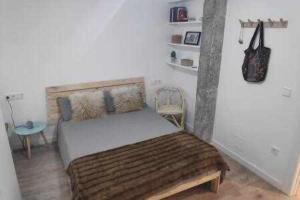Giường trong phòng chung tại Alameda 2 Dormitorios