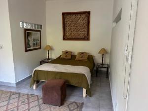 Katil atau katil-katil dalam bilik di Santika Villa Stellenbosch