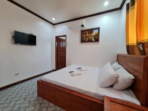 TV a/nebo společenská místnost v ubytování Alona Rose Hotel by SMS Hospitality