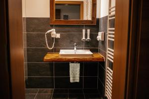 Łazienka w obiekcie Alpenhotel & Aparthotel Lanz
