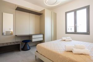Giường trong phòng chung tại Luxury Villa S Vito Lo capo +51 ảnh