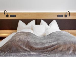 Ένα ή περισσότερα κρεβάτια σε δωμάτιο στο Apartment Apart Hanna am Hannesnhof by Interhome