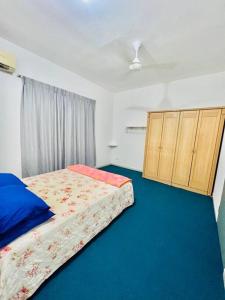 Postel nebo postele na pokoji v ubytování Astana a step to Sandakan City