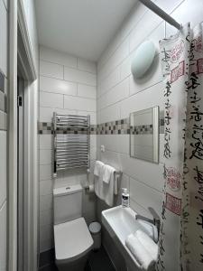 Ένα μπάνιο στο Sia Apartments Hotel