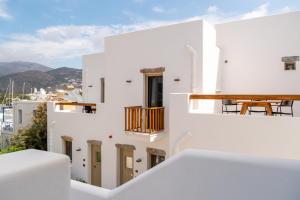 a view of the side of a white building at Soil Amorgos in Katapola