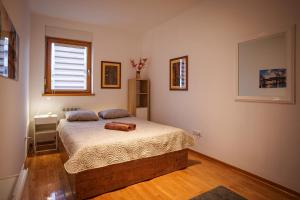 Postel nebo postele na pokoji v ubytování Yellow Lux apartment