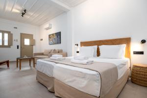 Postel nebo postele na pokoji v ubytování Soil Amorgos