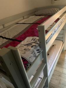 two bunk beds in a room with a bed at STUDIO REFAIT À NEUF BORD DE MER in Six-Fours-les-Plages +9 photos