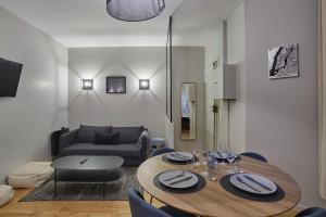 Posezení v ubytování Apartment Center of Paris by Studio prestige