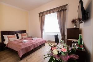 Posteľ alebo postele v izbe v ubytovaní Zámecký Hotel ANTON FLORIAN