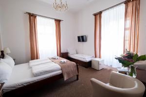 Posteľ alebo postele v izbe v ubytovaní Zámecký Hotel ANTON FLORIAN