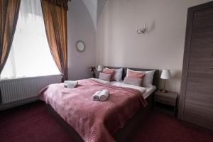 Posteľ alebo postele v izbe v ubytovaní Zámecký Hotel ANTON FLORIAN
