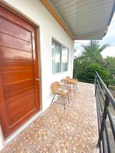 Balkón nebo terasa v ubytování Coconut Inn Moalboal