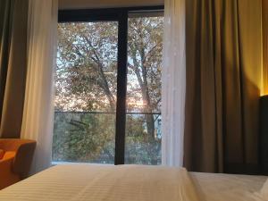 Ein Bett oder Betten in einem Zimmer der Unterkunft Avenue21