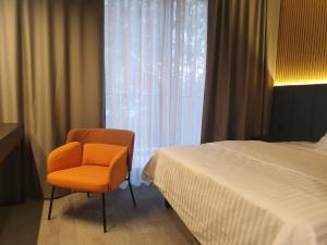 Ein Bett oder Betten in einem Zimmer der Unterkunft Avenue21