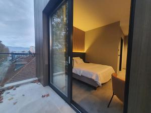 Ein Bett oder Betten in einem Zimmer der Unterkunft Avenue21