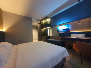 Ein Bett oder Betten in einem Zimmer der Unterkunft Avenue21