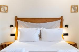Postel nebo postele na pokoji v ubytování Soil Amorgos
