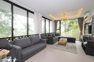 Istumisnurk majutusasutuses Villa Wezu Dago Village Bandung