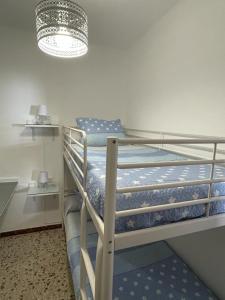 Ένα ή περισσότερα κρεβάτια σε δωμάτιο στο Casa Azucena