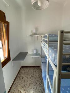 Ένα ή περισσότερα κρεβάτια σε δωμάτιο στο Casa Azucena