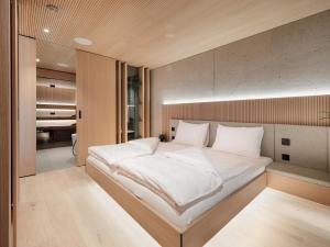 Letto o letti in una camera di Loxone Campus