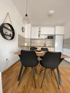 Kuchyň nebo kuchyňský kout v ubytování Angel Apartment