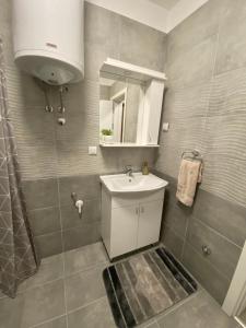 Koupelna v ubytování Angel Apartment
