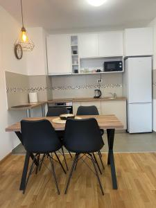 Kuchyň nebo kuchyňský kout v ubytování Angel Apartment