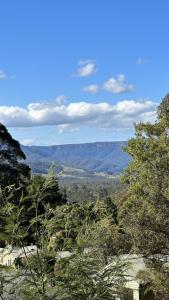 a view of a valley with trees and mountains at Mike's Kangaroo Valley in Kangaroo Valley