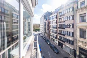 a view of a city street from a building at Luxury apartment with free parking in Ostend