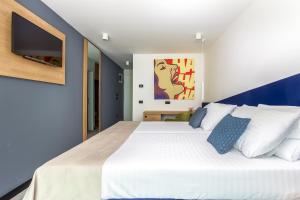 Postel nebo postele na pokoji v ubytování Hotel Ad Turres