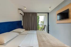 Postel nebo postele na pokoji v ubytování Hotel Ad Turres