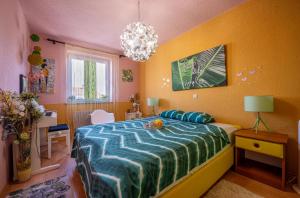 Postel nebo postele na pokoji v ubytování Venus Holiday House with Pool