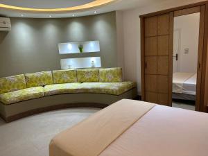 A bed or beds in a room at Rentrific